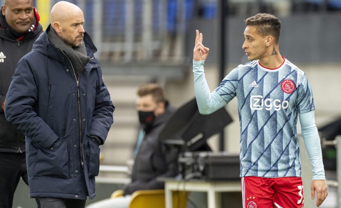 Erik ten Hag and Antony in discussion during an Ajax game.