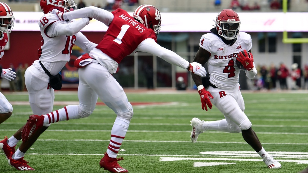 Aaron Young runs three yards for a Rutgers touchdown