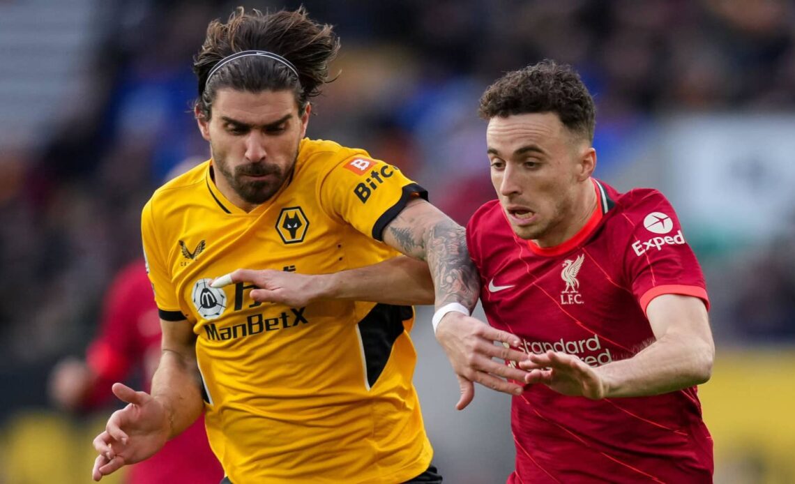 Wolves midfielder Ruben Neves battling Liverpool striker Diogo Jota