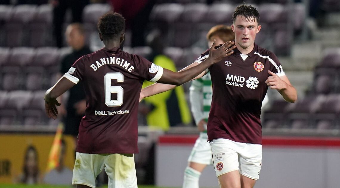 Hearts' John Souttar celebrates scoring their side's second goal of the game with team-mate Beni Baningime