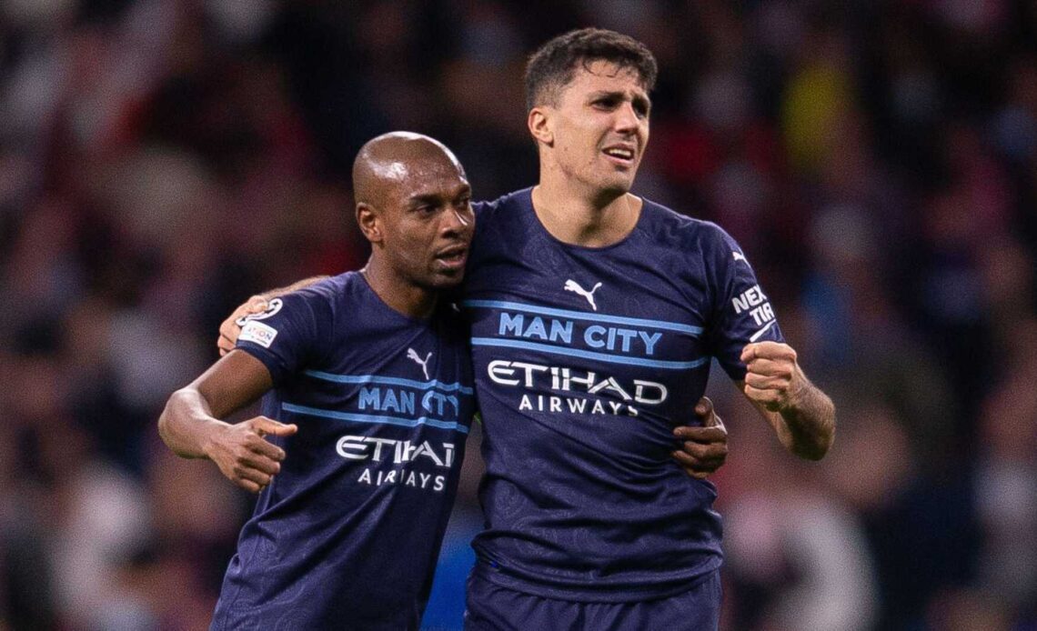 Fernandinho and Rodri celebrating for Manchester City