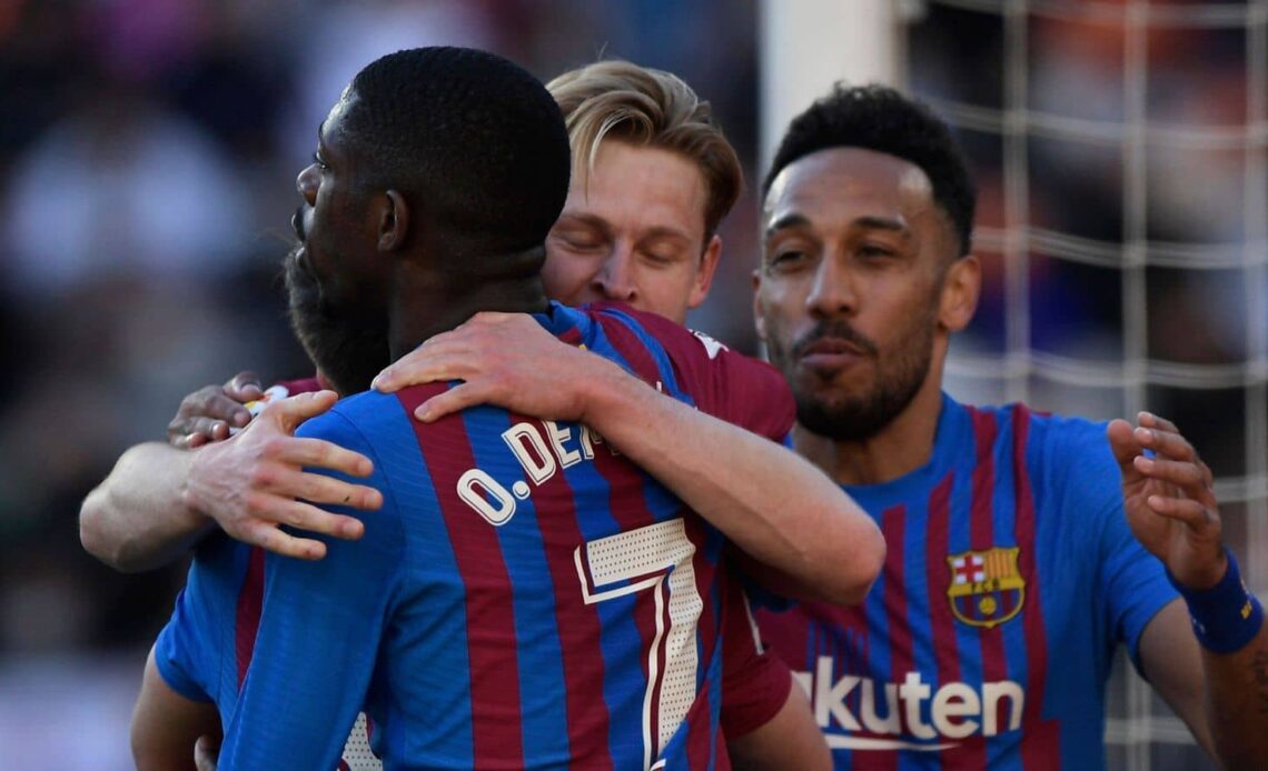 Frenkie de Jong celebrates scoring their second goal with Ousmane Dembele, Pierre-Emerick Aubameyang celebrate a goal during LaLiga match against Valencia