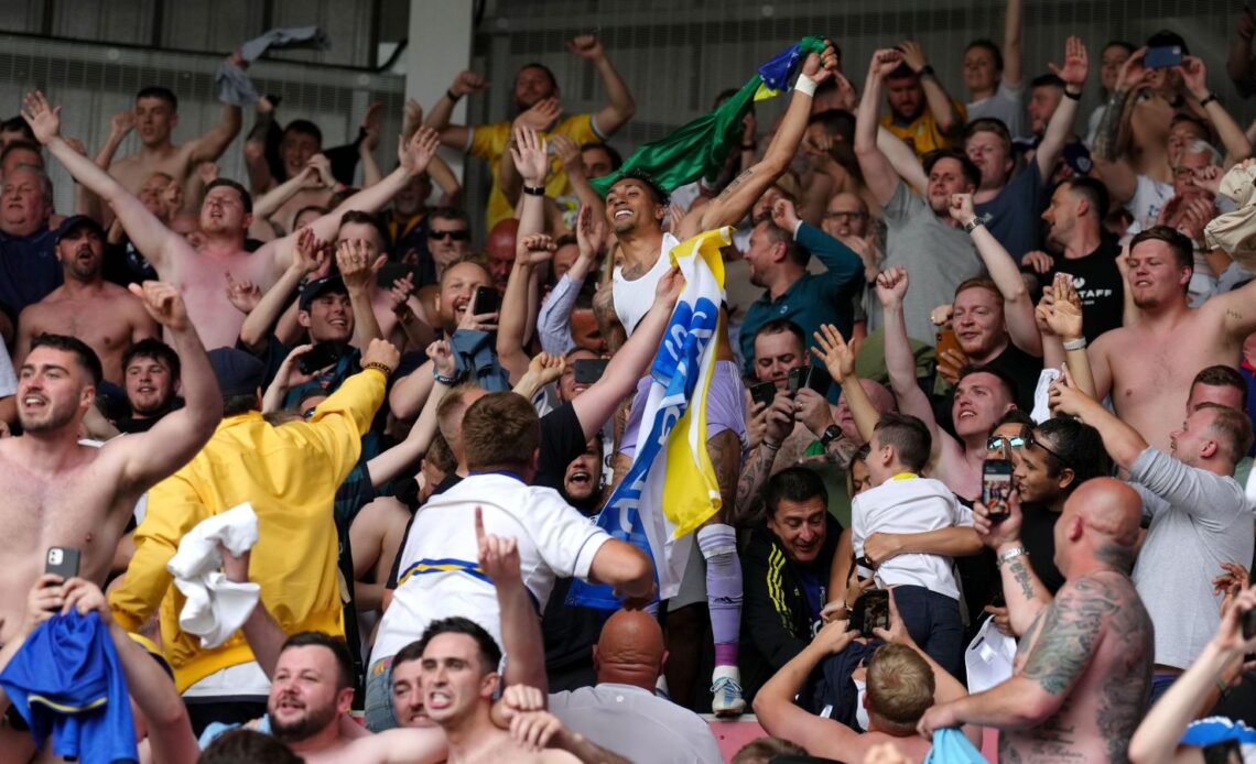 Leeds winger Raphinha celebrates with fans