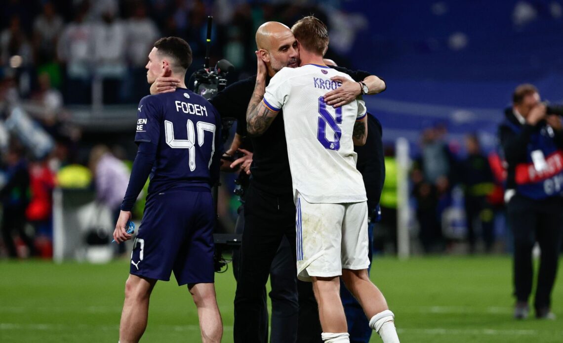 Toni Kroos with Manchester City boss Pep Guardiola