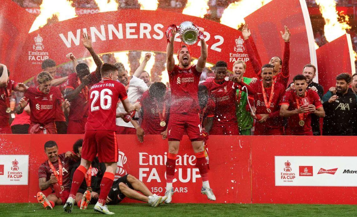 LIverpool with one of their four trophies