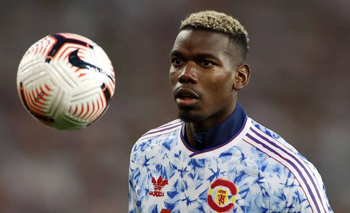 Paul Pogba warms up for Man Utd prior to Premier League game at Arsenal