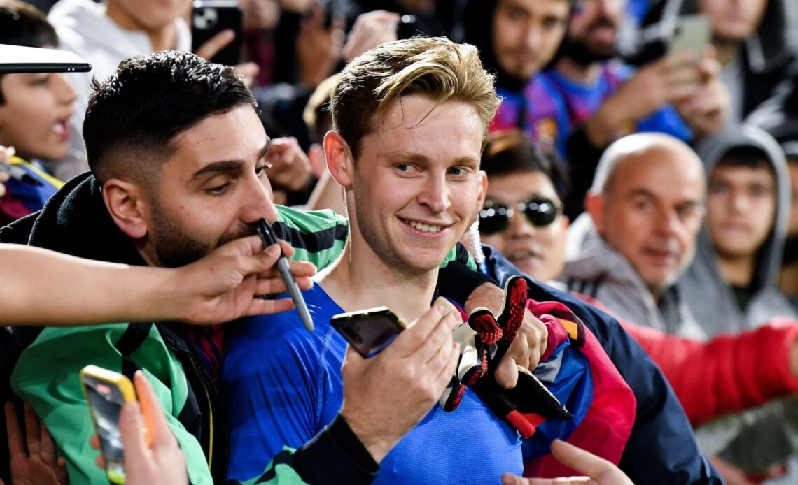 Reported Manchester United target Frenkie De Jong taking pictures with fans