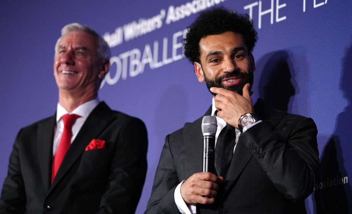 Liverpool star Mo Salah stands alongside Ian Rush
