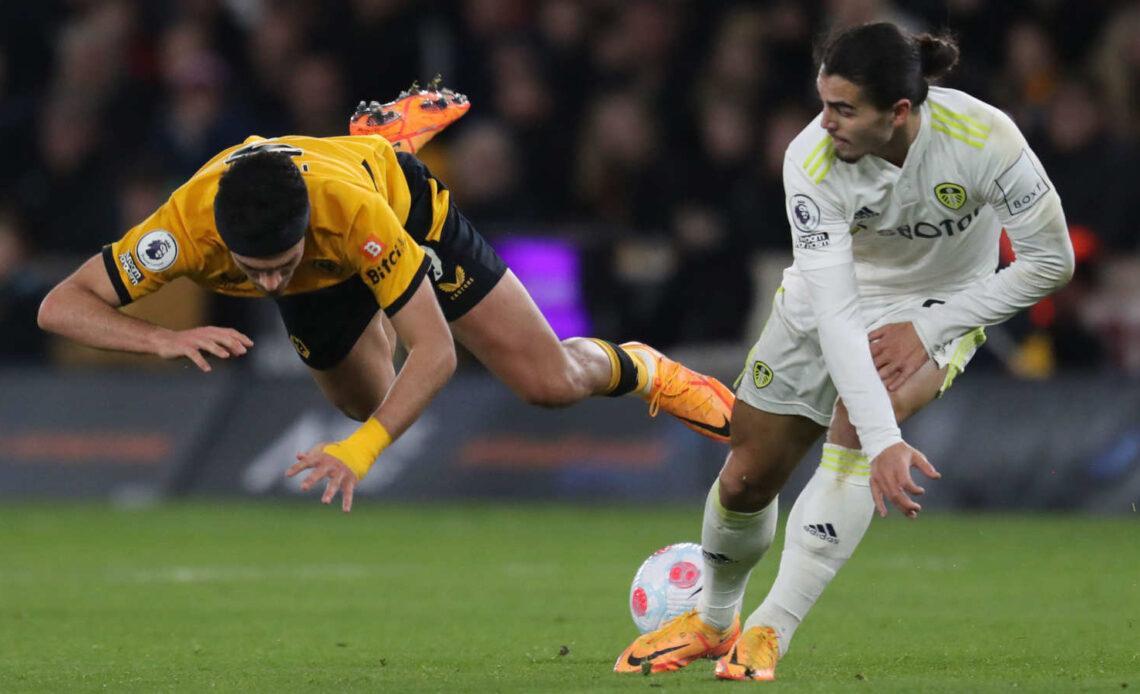 Wolves challenge for the ball against Leeds in the Premier League