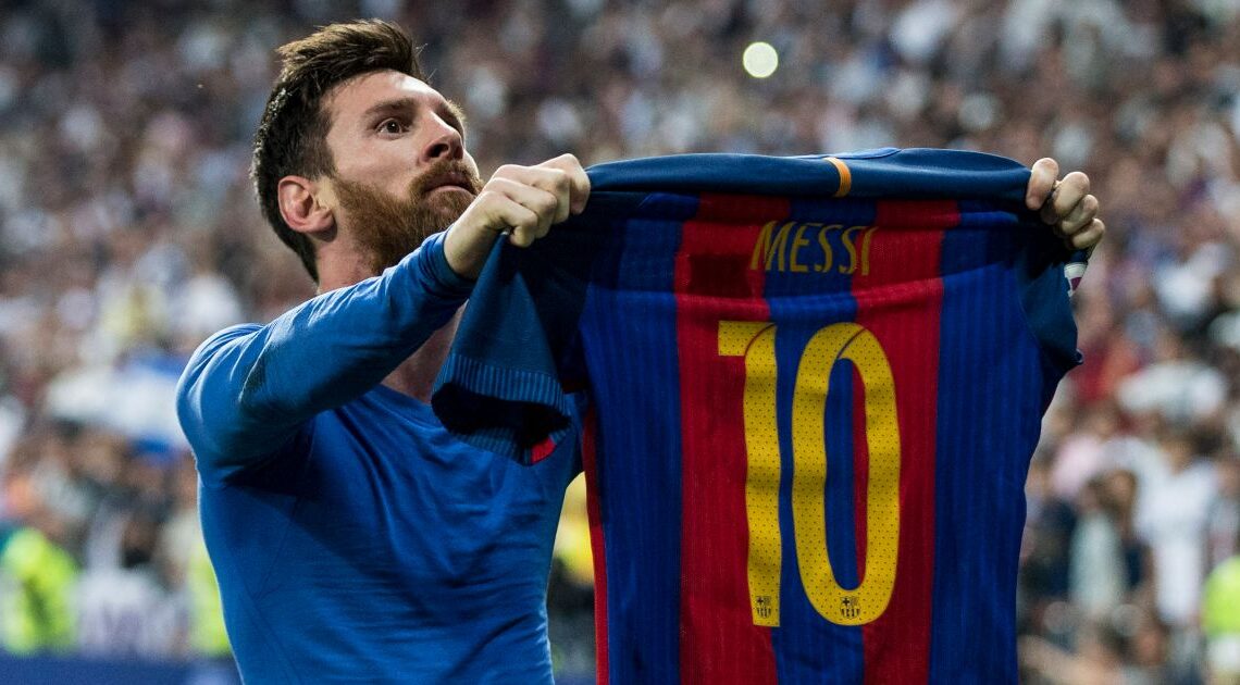 Lionel Messi of Barcelona hold his shirt up to the Real Madrid fans. April 2017.