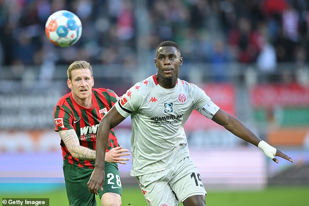 Mainz defender Moussa Niakhate (right) has missed just eight league games in four years