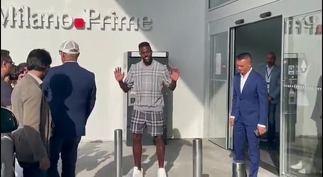 Origi waved to fans as he closes in on completing his move to AC Milan on a free transfer