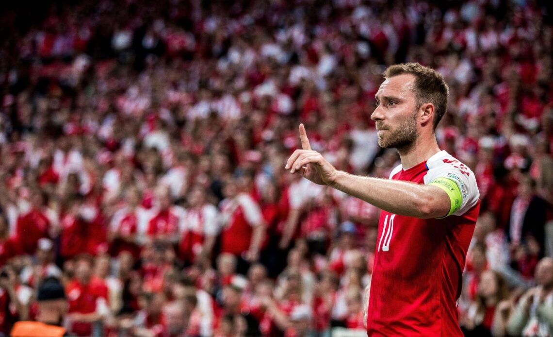 Man Utd target Christian Eriksen makes a signal to his team-mates