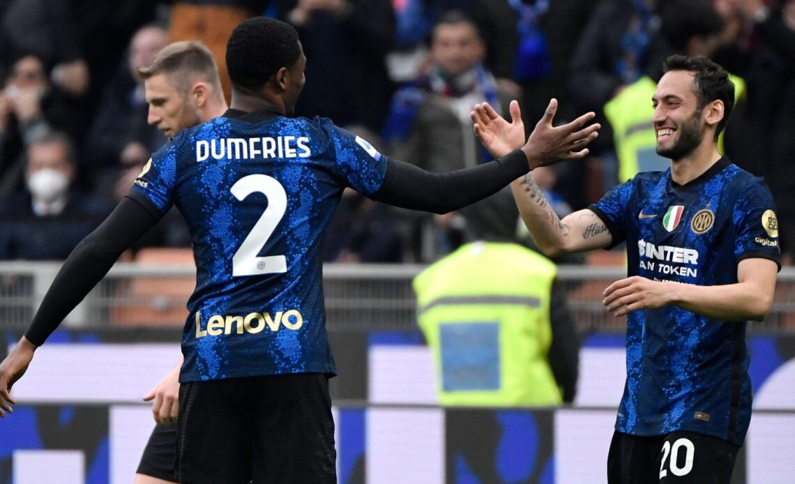 Reported Newcastle targets Hakan Calhanoglu and Denzel Dumfries celebrate a goal