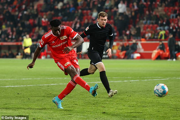 Taiwo Awoniyi (left) scored 20 goals in 43 appearances last season, including 15 in the league