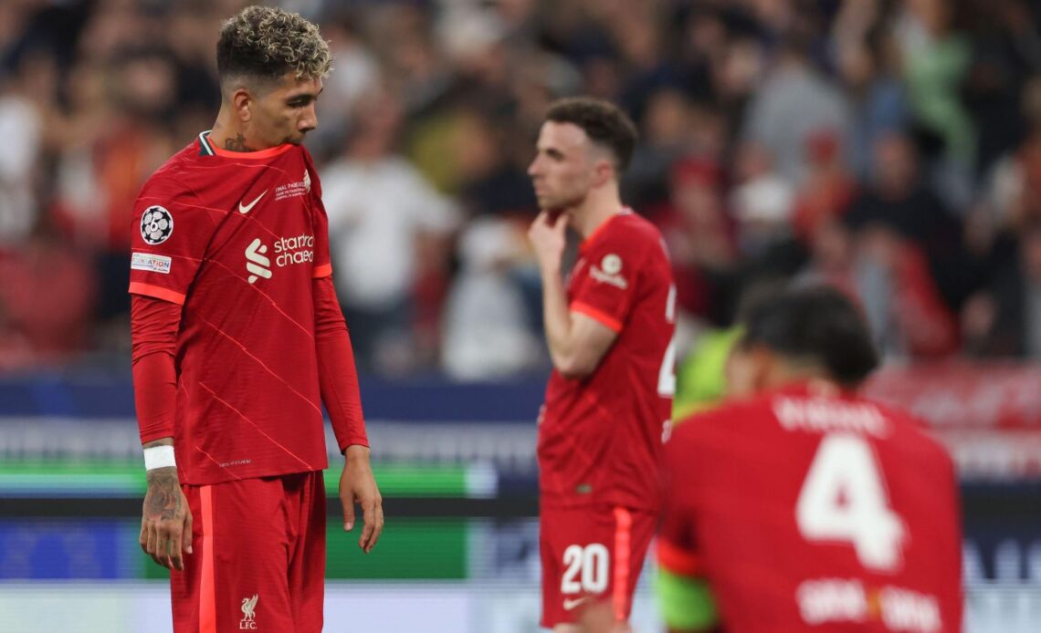 Liverpool striker Roberto Firmino and other players react