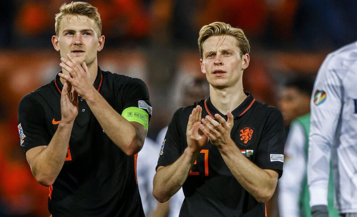 Frenkie De Jong and Matthijs De Ligt applaud Holland fans.