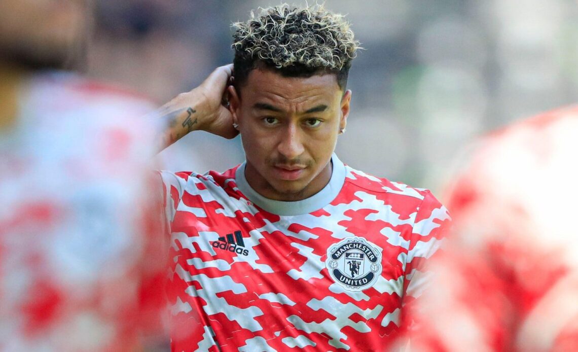 Jesse Lingard warms up before a Manchester United match.