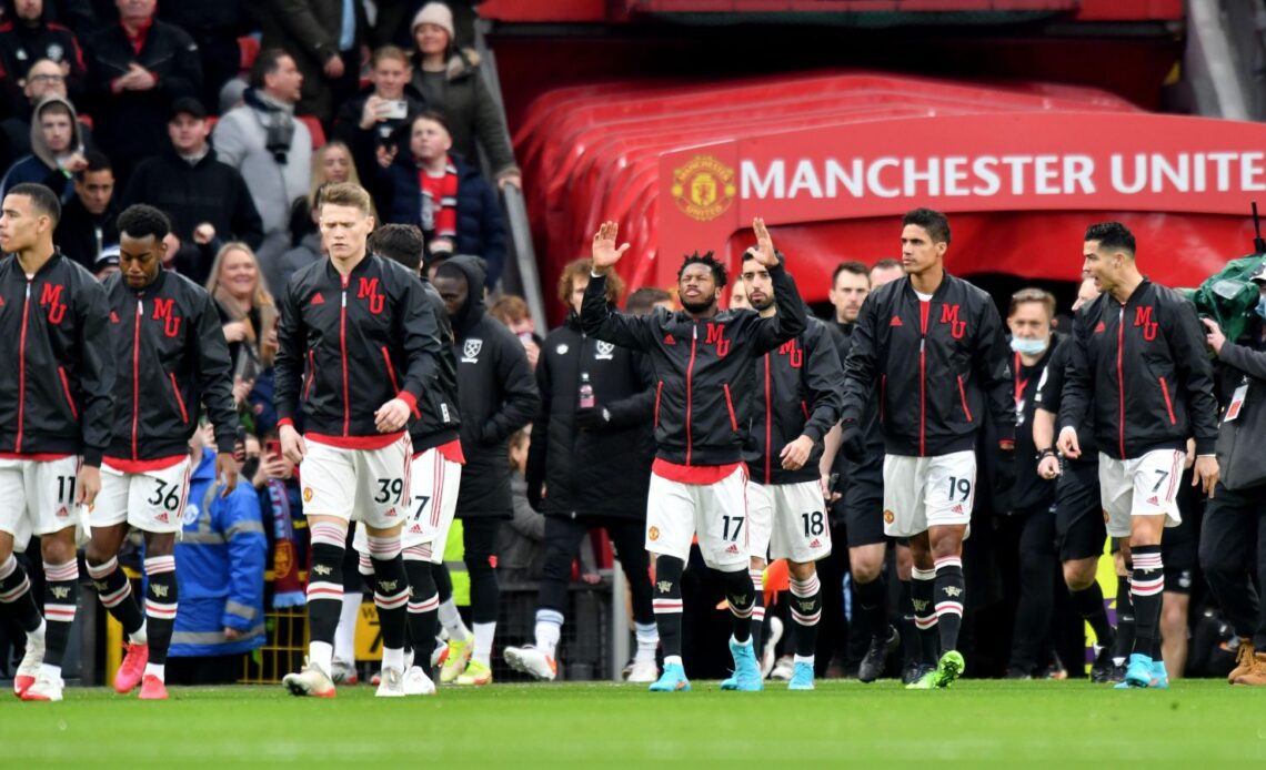 Manchester United players walk out at Old Trafford.