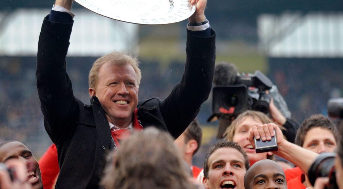 Steve McClaren of Twente presents the Championship trophy after beating NAC Breda in Breda May 2, 2010.