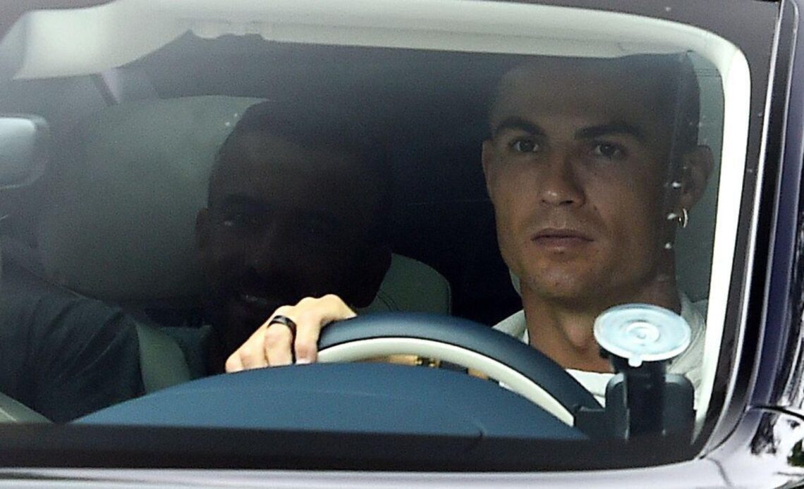 Man Utd star Cristiano Ronaldo steers a car