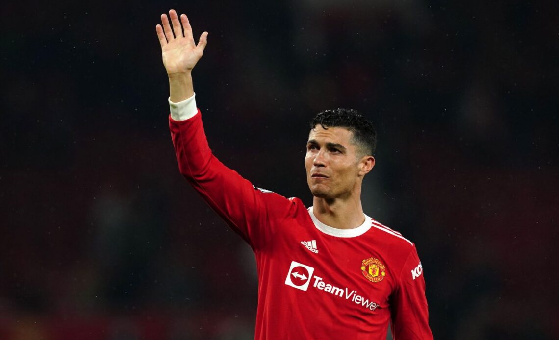 Man Utd striker Cristiano Ronaldo waves to the fans