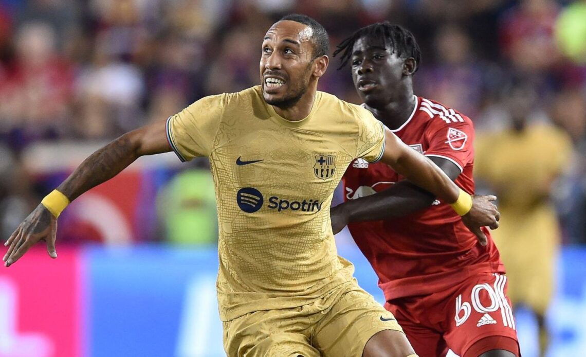 Chelsea target Pierre-Emerick Aubamayeng holds off a challenge