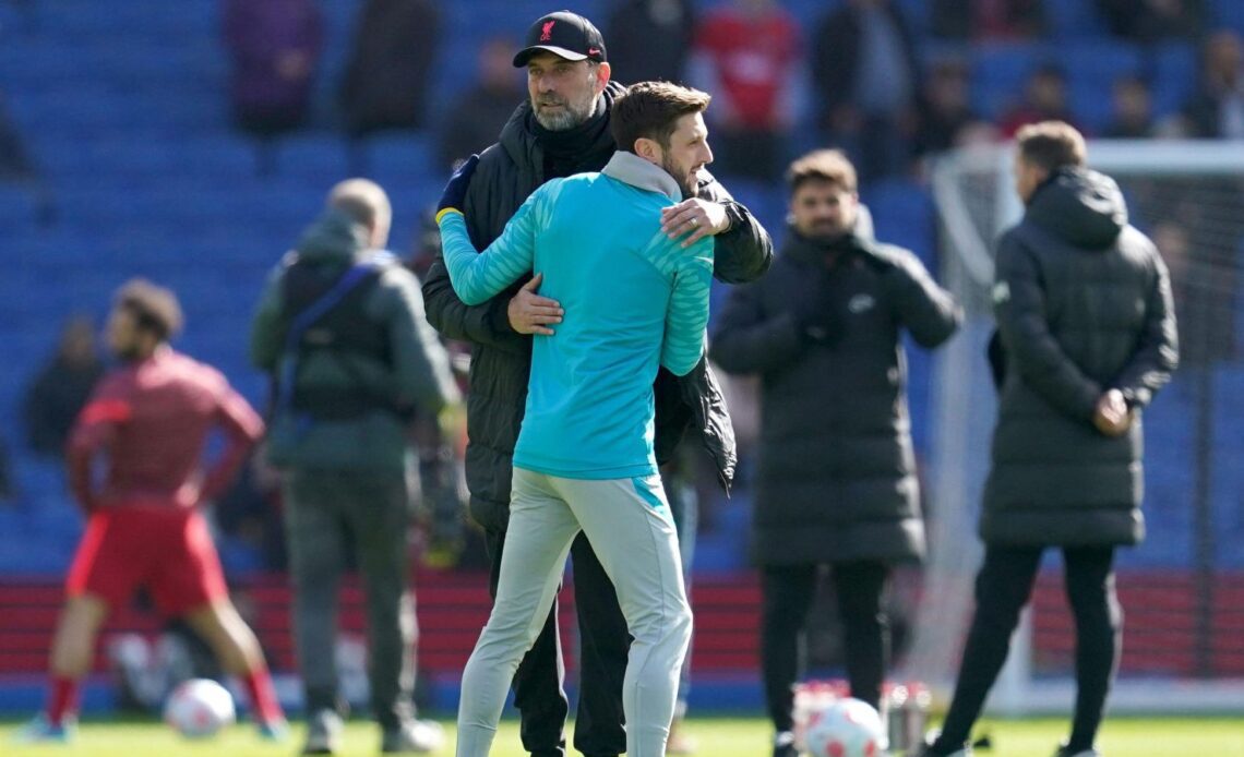 Liverpool boss Jurgen Klopp and Adam Lallana give each other a hug