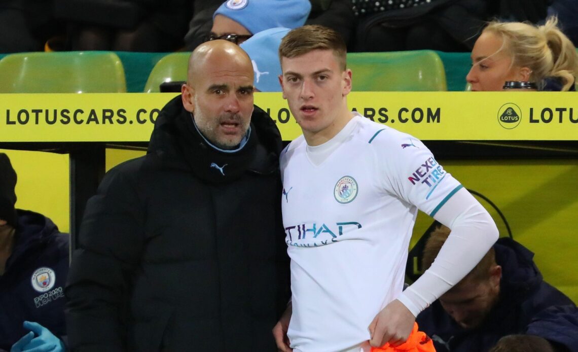 Man City youngster Liam Delap with Pep Guardiola
