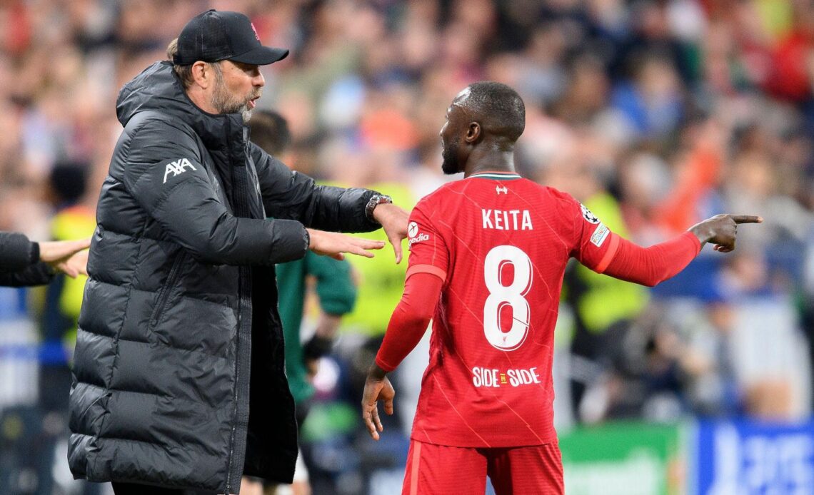 Liverpool boss Jurgen Klopp speaks to Naby Keita