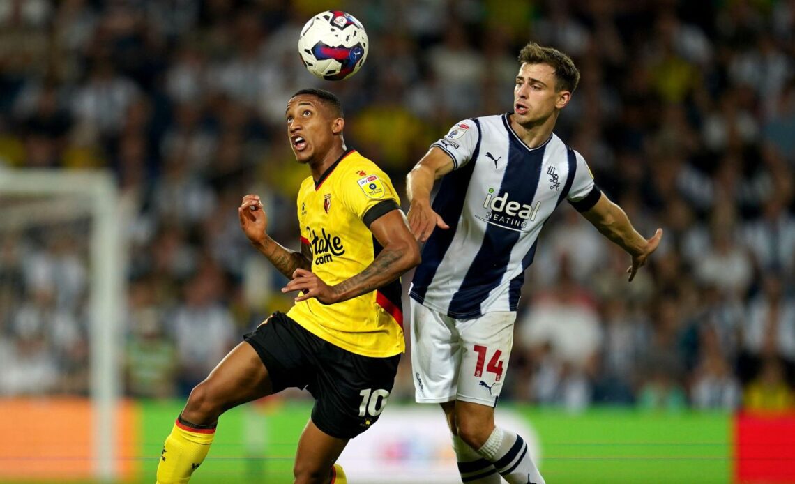 Newcastle target Joao Pedro heads the ball past a player