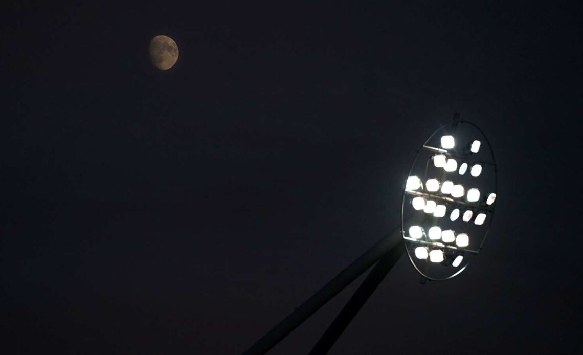 A fllodlight against a night sky - foodlighting could become expensive for clubs during the cost of living crisis