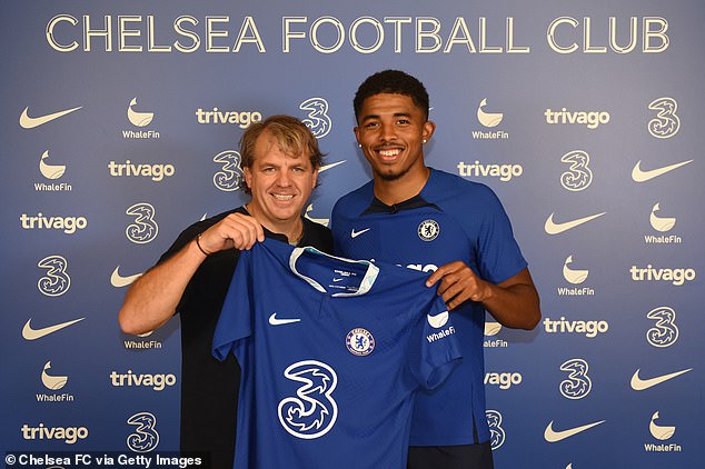 £70M Chelsea signing Wesley Fofana poses for a photograph with chairman Todd Boehly