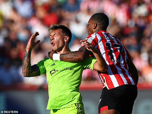 The 24-year-old was widely considered to have been 'bullied' by 6ft 2ins Brentford striker Ivan Toney (right) as United were thrashed 4-0 against Brentford in their second league game
