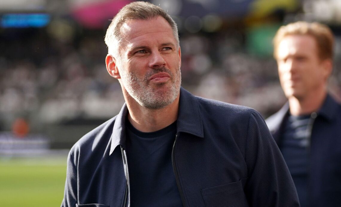 Liverpool legend Jamie Carragher smiles during his role as a pundit