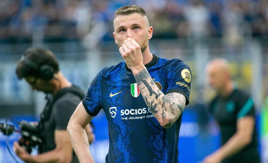 Chelsea target Milan Skriniar squeezes his nose