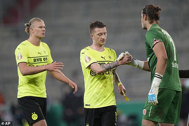 Erling Haaland will come up against Marco Reus (centre) and the rest of his former Borussia Dortmund team-mates when the Bundesliga side face Manchester City on Wednesday evening