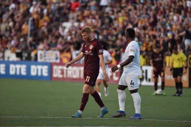 Detroit City FC' Connor Rutz and Indy Eleven's Mechack Jérôme on the field