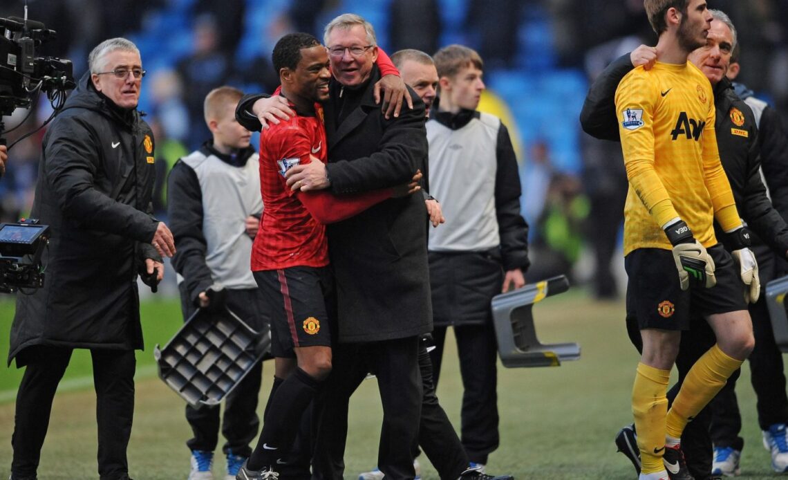 Man Utd defender Patrice Evra hugs Sir Alex Ferguson