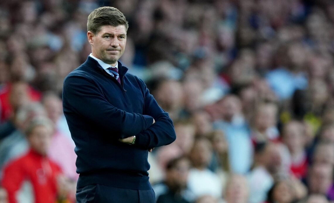 Steven Gerrard watches a match from the touchline