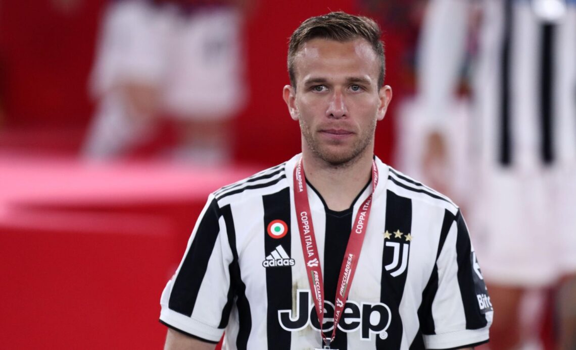 Liverpool target Arthur with his medal