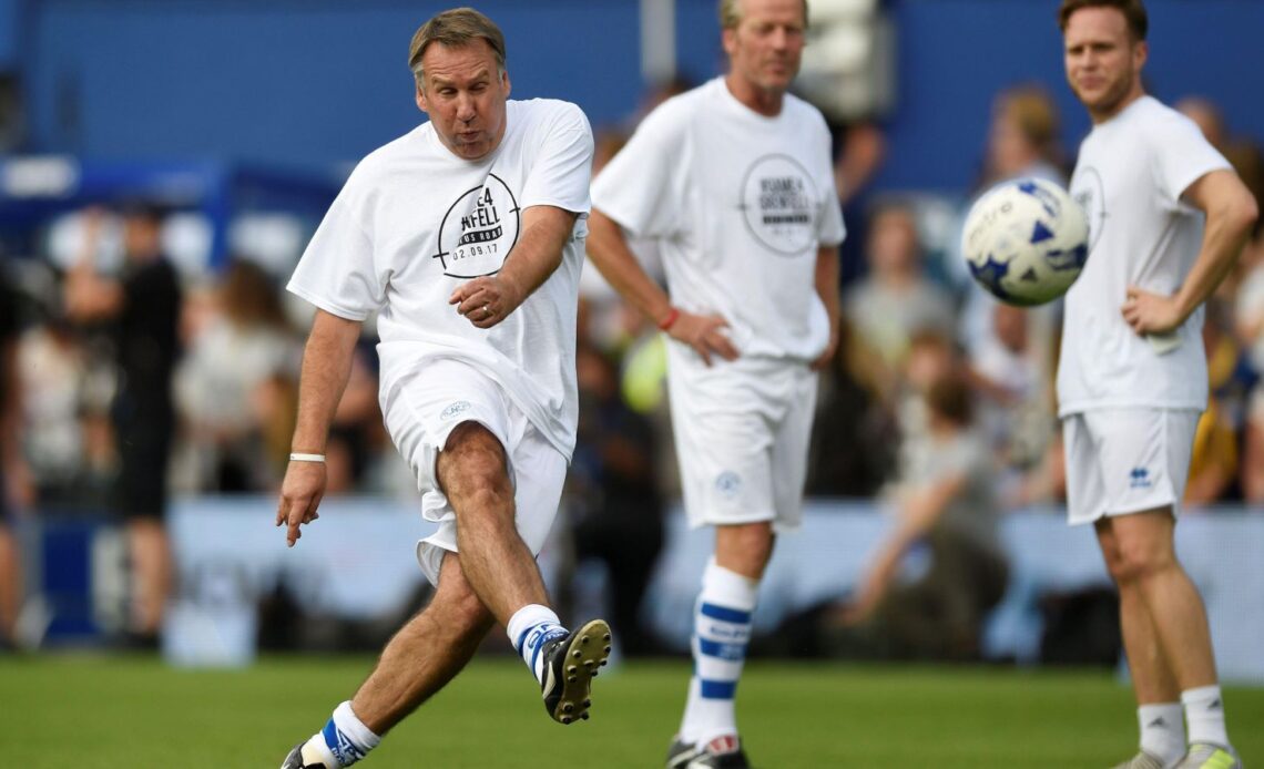 Former Arsenal midfielder Paul Merson shoots during a warm-up