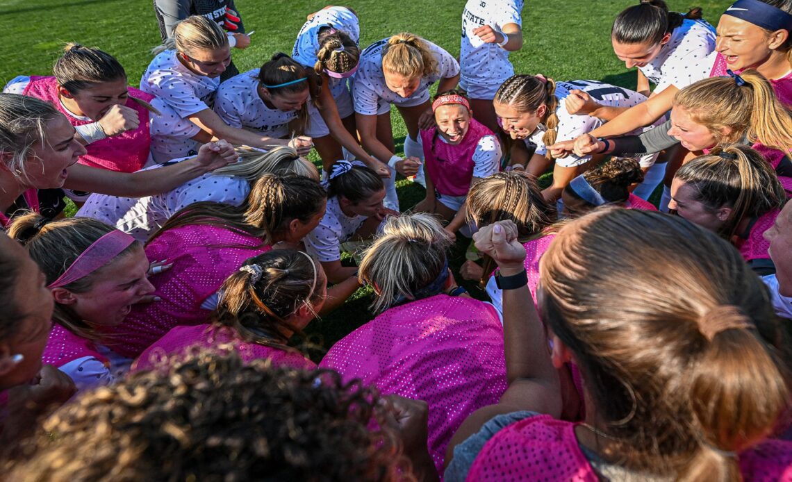 Penn State huddles prior to the game with West Virginia. The No. 10 Penn State women's soccer team earned its second win of the season Thursday night August 25, 2022, shutting out No. 21 West Virginia 2-0 at Jeffrey Field. 

Photo by Mark Selders