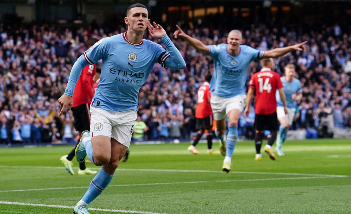 Phil Foden celebartes scoring for Manchester City against Manchester United