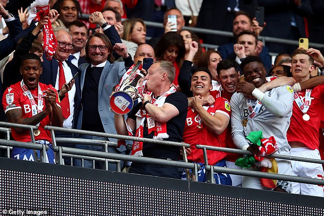 Cooper is a favourite among fans after guiding them back into the Premier League for the first time in 23 years after winning the Championship play-off final back in May (pictured above)