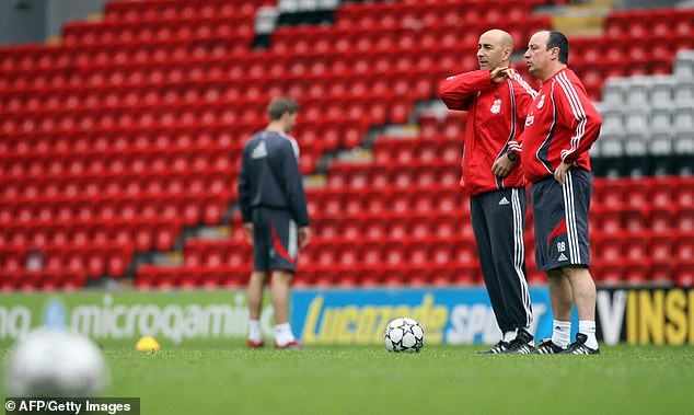 Ayestaran (second right) was No 2 to Spaniard Rafael Benitez at Liverpool from 2004-2007