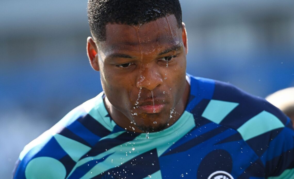 Reported Chelsea target Denzel Dumfries after splashing water on his face
