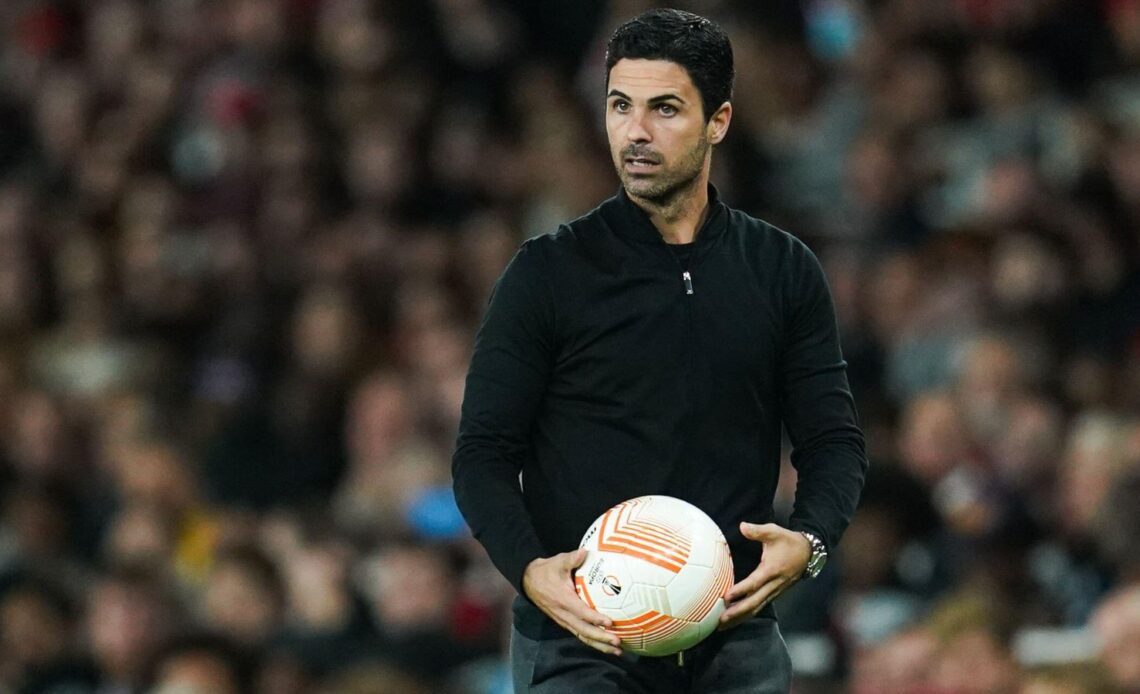 Arsenal boss Mikel Arteta holds the ball