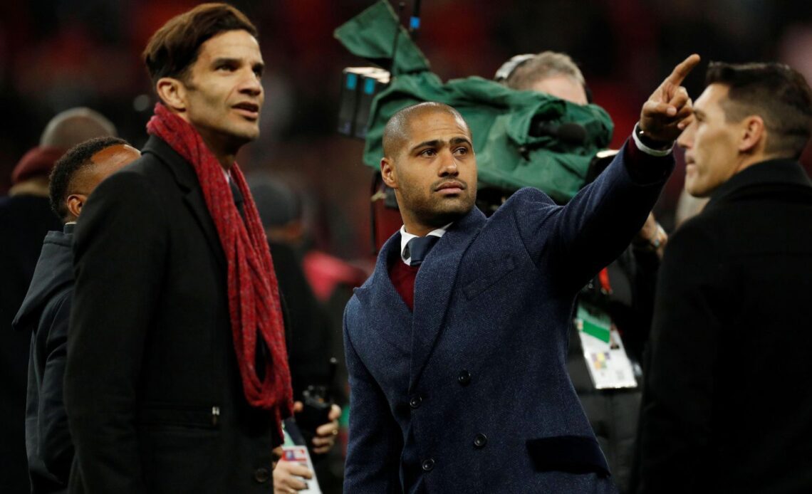 Former Liverpool defender Glen Johnson points to someone in the stands