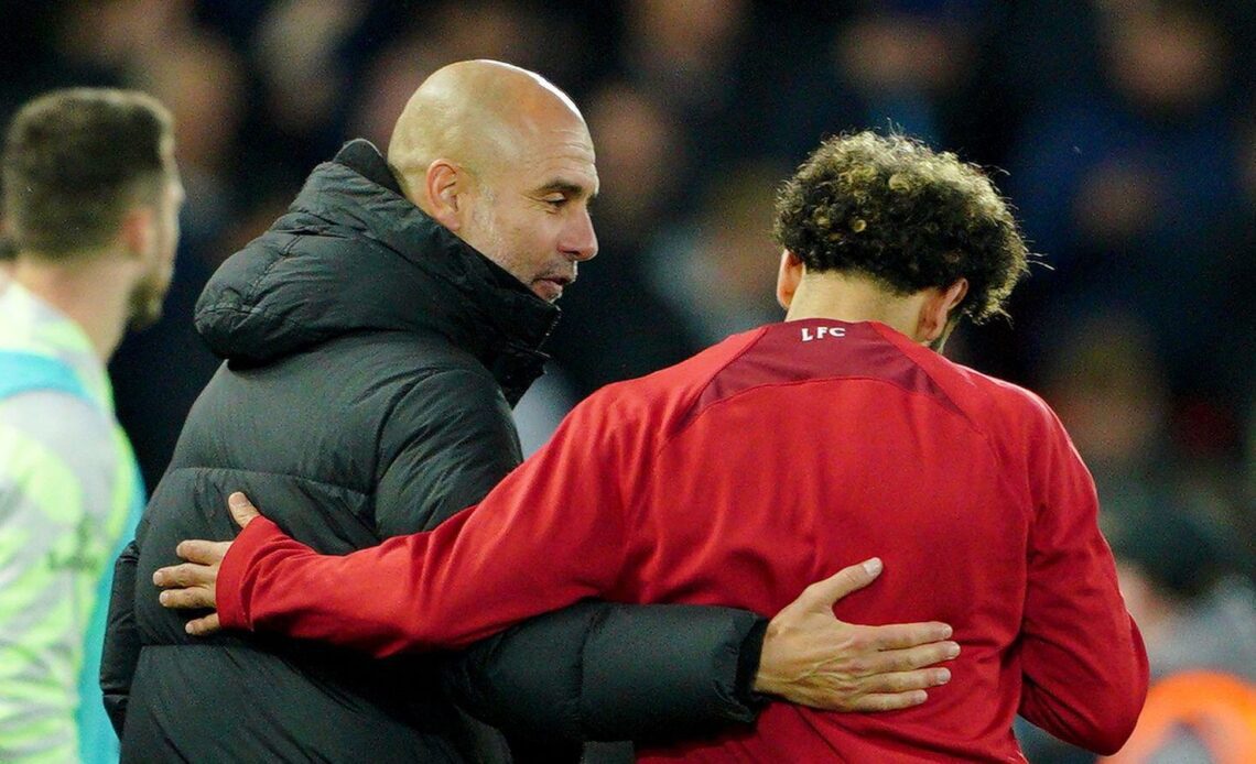 Pep Guardiola embraces Mo Salah